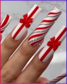 Deck the halls and your nails with the festive spirit of Christmas! This season, embrace the classic elegance of white, red, and silver with these gift-inspired nail designs. From dainty bows to shimmering ornaments, these designs will have you feeling holly and jolly all season long. #christmasnails #holidaynails #fall nails #christmas Holiday Nails Medium Length, Christmas Nail Designs Red And Silver, Red Bow Nails Christmas, Fall Festive Nails, Christmas Bow Nails Design, Long Christmas Nails Acrylic, Red Xmas Nails Designs, Red Bow Christmas Nails, Fall Coffin Nails 2024