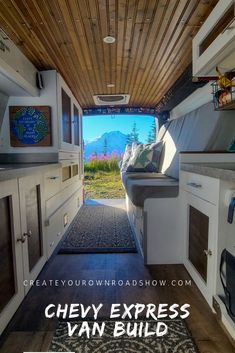 the interior of an rv with wood ceilinging and white cabinets, along with text reading create your own road show chey express van build