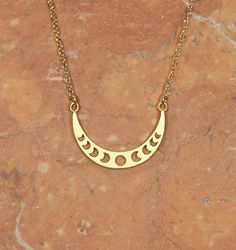 Moon phases necklace, crescent moon, moon jewelry, astrology, waxing moon, crescent necklace A 14k gold vermeil moon phase charm hanging happily from a 14k gold vermeil chain in the length of your choice! This beauty measures Looking for other charm necklaces? https://www.etsy.com/shop/BubuRuby?section_id=12318467 More from Bubu Ruby? https://www.etsy.com/shop/BubuRuby?ref=si_shop ♥ Handmade with love in sunny California ♥ These gems will arrive happily in a gift pouch or box Adjustable Crescent Moon Phase Charm Necklace, Celestial Crescent Moon Phase Necklace, Adjustable Crescent Necklace In Celestial Style, Adjustable Crescent Celestial Necklace, Celestial Crescent Charm Necklaces With Adjustable Chain, Spiritual Crescent Moon Phase Charm Necklace, Adjustable Crescent Moon Charm Necklace, Dainty Moon Phase Charm Necklace, Moon Shaped Brass Necklace With Moon Charm