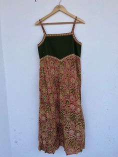 Bohemian cotton green floral printed long gown, block print maxi dress, cotton smocked dresses, strap outfits, cotton maxi, long maxi, green dresses, hand block print dress, smocking dress, comfortable dresses, summer dresses, beautiful gift for her, cutsom dress, indian dress, indian wholesaler, indian cotton dresses, strap dresses  Feel beautiful and confident throughout your days wearing our block printed outfits, made with high quality soft and breathable cotton fabric.  The print on the dre Printed Outfits, Smocking Dress, Comfortable Dresses, Smocked Dresses, Dresses Beautiful, Dress Comfortable, Strap Dresses, Green Dresses, Dress Bohemian