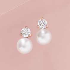 Made of solid 14k gold (not plated, not filled, not vermeil), these earrings are available in your choice of yellow, white, or rose gold (as well as platinum upon request) Adorned with genuine freshwater cultured pearls and sparkling diamonds together creating the perfect balance of sophistication and sparkle Available in three sizes, 0.12ctw, 0.20ctw, and 0.50ctw - scroll down for dimensions and further specifications Meticulously crafted, these earrings are elegant with an modern twist. Delivered in a beautiful gift box these earrings make the perfect for your nearest and dearest. Diamond & Pearl Stud Earrings Metal: 14K Solid Gold or Platinum Diamond Quality: G color, VS clarity Gemstone: White Freshwater Cultured Pearl Closure: Friction Back Sold as pair. Available Sizes: 0.12ctw Lengt Classic Rose Gold Earrings For Everyday Luxury, Timeless Rose Gold Earrings For Everyday Luxury, Luxury Rose Gold Earrings With Prong Setting, Classic Rose Gold Earrings For Formal Occasions, Elegant Rose Gold Diamond Earrings With Brilliant Cut, Rose Gold Classic Drop Earrings, Classic Rose Gold Bridal Earrings With Prong Setting, Classic Rose Gold Drop Earrings, Timeless Rose Gold Earrings For Formal Occasions