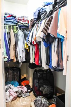 the closet is full of clothes and other items