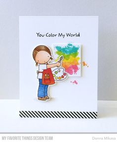 a handmade card with a little boy holding a paintbrush and the words you color my world on it