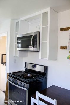 the kitchen is clean and ready to be used as a dining room or office space