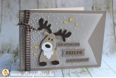 a close up of a card with a reindeer on it