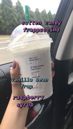 a person holding up a drink in their hand with the caption, cotton candy trappuccino vanilla bean trap rasp