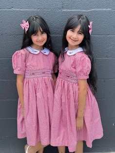 Red and white gingham dress is perfect holiday dress. This classic dress is hand-smocked and embroidered bodice with an in-built muslin petticoat for comfort.  Sizes 3-4, 8-9 What we love.   ✨Made from 100% cotton fabric ✨Hand embroidered and smocked with sphositicated details.  ✨It has peter pan collar with embroidered red roses.  ✨Soft Peticoat  ✨Tie at the back  ✨Ethically made with love by my mum We are based in Brisbane and we ship Australia wide.  Thank you for supporting small business ♥️ Red Hand Smocked Dress, Red Gingham Dress, White Gingham Dress, Plaid Dresses, Red And White Gingham, Embroidered Bodice, Red Gingham, Smocked Dress, Gingham Dress