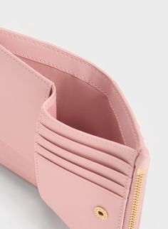 Light Pink Gemma Quilted Card Holder | CHARLES & KEITH Compact Pink Card Holder With Card Slots, Pink Travel Coin Purse With Card Slots, Pink Coin Purse With Interior Card Slots, Pink Bifold Coin Purse, Pink Bifold Coin Purse For Everyday, Everyday Pink Bifold Coin Purse, Pink Wallets With Zipper Pocket For Everyday Use, Compact Pink Card Holder For Everyday Use, Pink Rectangular Coin Purse With Card Slots