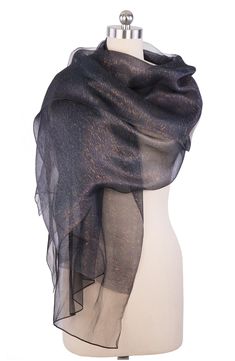 A sheer, shimmering scarf that will quickly become your go-to piece for going out. Bonus: it looks gorgeous as both a wrap and a scarf. 28" x 75" (one size) Pattern: Solid 100% silk Hand wash Imported Black Sparkly Scarf, Celestial Shawl, Evening Wraps, Dream Dresses, Scarf Material, Silky Dress, Fashion Marketing, Wrap Scarf, Silk Wrap