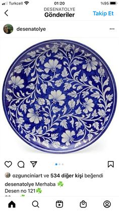 a blue and white plate with flowers on the bottom is displayed in an instagram