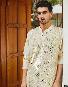 8 Kurta Design For Men Ideas That Are Sure To Wow At Events Kurta For Mehendi Function Men, India Fashion Men, Indian Wedding Clothes For Men, Mens Indian Wear, Wedding Kurta, Wedding Kurta For Men, Haldi Outfits, Groom Dress Men, Wedding Dresses Men Indian