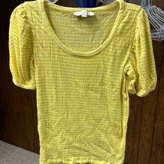 Brand New. I Bought It, But Couldn’t Return It. In A Crinkled Texture With Pretty Puff Sleeves, This Top Is An Understated Staple With Flirty Appeal. Scoop Neck. Short Sleeves. Fit: Classic Follows Your Contours With A Little Room Fabric: Soft Knit Length: Regular Hits Below Natural Waist 24" Long Available In: Yellow Fabric & Care 60% Cotton 39% Modal 1% Spandex Machine Washable Trendy Spring Blouse With Crinkle Texture, Spring Trendy Blouse With Crinkle Texture, Spring Cotton Top With Crinkle Texture, Spring Cotton Crinkle Texture Top, Yellow Ruched Tops For Spring, Fitted Crinkle Texture Tops For Spring, Hot Pink Blouses, Yellow Floral Blouse, Womens Black Shorts