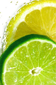 two lemons and one lime are in the water