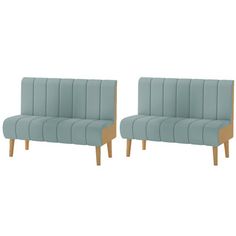 two blue upholstered chairs sitting next to each other