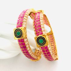 2.6 Kundan Ruby Bangles/CZ Ruby Emerald Bangles/Ruby Sabyasachi American Diamond Traditional Bangles/BridalKundan AD/CZ bangles@AryaFashions Features Traditional American diamond bangles Set Handcrafted To Perfection Light Weight Perfect For Indian Weddings And Celebrations A Beautiful & Memorable Gift for Weddings and Special Occasions Available in 2.6 size only Facebook: www.facebook.com/shoparyafashions Pinterest: www.pinterest.com/aryafashions Instagram: www.instagram.com/shoparyafashion Temple Jewelry Style Round Bangle For Party, Temple Jewelry Meenakari Bangle For Parties, Temple Jewelry Style Bangle For Party, Temple Jewelry Bangle For Party, Ruby Emerald Bangles, Emerald Bangles, Bangles Bridal, Cz Bangles, Traditional Bangles