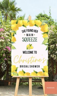 a welcome sign for a bridal shower with lemons on it and the words, she found her squeezeze welcome to christine's bridal shower