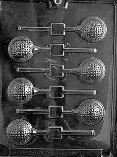 a set of six serving utensils with golf balls in the middle and two on each side