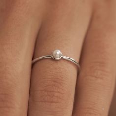 Sterling Silver Delicate Pearl Ring Weight: 1.1g Band width: 1mm Stone: 3mm Freshwater Pearl Marked .925 STΔR SKU #R932PL High Polish White Pearl Ring Design Silver, Silver Ring With Pearl, Minimalist Pearl Ring, Rings Design Silver, Pearl Rings In Silver, Dainty Pearl Ring, Minimalist Silver Ring With Pearl Drop, Dainty Rings Silver, Silver Ring With Stone