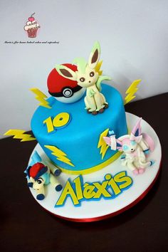 a pokemon themed birthday cake on a table