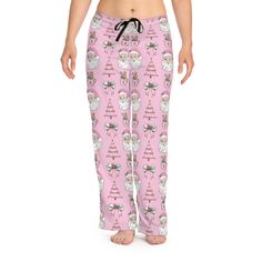 About this product: Pink Christmas Women's Pajama Pants, Pink Coquette Santa Claus PJ Pants, Festive Lounge Pants for Her, Holiday Loungewear, Gift for Her ✨Product details ✨ 100% polyester jersey knit fabric, along with the relaxed fit, makes for the ultimate comfort choice while kicking back at home. Meanwhile, the back elastic with the drawstring tie creates the perfect fit while the all-over-print adds a stylish dimension unique to your taste.  .: 100% polyester .: White seam thread .: Light fabric .: Relaxed comfort fit .: Back elastic and black drawstring tie .: Sewn-in care label .: Assembled in the USA from globally sourced parts Holiday Loungewear, Womens Pajamas Pants, Pink Coquette, Pj Pants, Sleep Shorts, Pajama Robe, Jersey Knit Fabric, Christmas Women, Pink Christmas