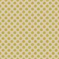 a green and white polka dot pattern on fabric