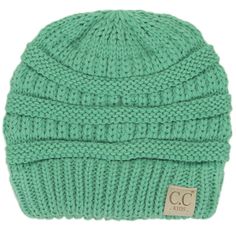 a green knitted hat with the c logo on it