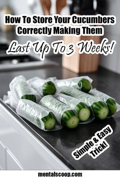 cucumbers are wrapped in plastic on the kitchen counter with text overlay that reads how to store your cucumbers correctly making them last up to 3 weeks