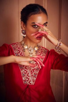 Red kurta featuring a V neck, three fourth sleeves, and floral embroidery on the neckline and cuffs. Paired with matching tulip pant, both adorned with ghungroo tassels and a scallop hem., Fit: Relaxed Tulip Pants, Red Kurta, Scallop Hem, Embroidery Floral, Embroidered Neckline, Women Kurta, Pattern Embroidery, Silk Embroidery, Scalloped Hem