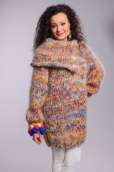 "SUPER THICK Cozy soft mohair sweater. This unique sweater is Knitted in beige, orange, blue melange. Bobbles on cuffs. Turtleneck with buttons, giving you the opportunity to change your style. This is a very distinct piece for your wardrobe, combining the comfortable fit and stunning style. an absolute head turner:) Fully enjoy this 100 % hand knitted piece of art Designer sweater - by Tangles Materials : 6 - strands Soft premium quality longhair mohair. Color : Orange/Blue/ Beige Measurements Jumper Men, Hand Knitted Dress, Pull Mohair, Feminine Clothing, Sweater Chunky, Pull Oversize, Thick Sweater, Unique Sweaters, Boho Sweater