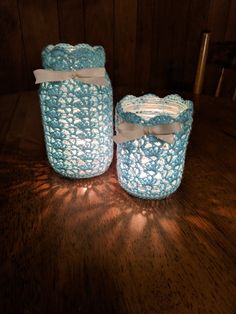 two crocheted baskets sitting on top of a wooden table with the text free pattern