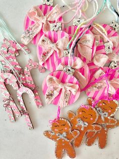 some pink and orange ornaments are laying on the floor next to other items that include hair clips