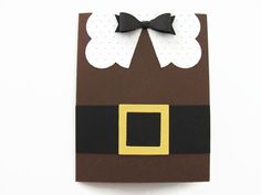 a paper bag with a bow on it