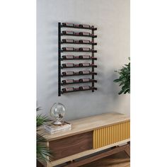 a wall mounted wine rack on the side of a wooden cabinet in a living room