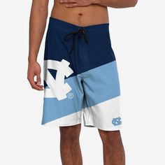 North Carolina Tar Heels Color Dive Boardshorts FOCO S - FOCO.com Blue Bottoms For Water Sports During Beach Season, Short Swim Trunks For Summer Sports Events, Summer Short Swim Trunks For Sports, Team-colored Summer Shorts, Team-colored Short Bottoms For Summer, Team Spirit Sports Shorts For Summer, Team-colored Bottoms For Summer Sports Events, Casual Surfing Athletic Shorts With Built-in Shorts, Blue Swimwear For Summer Sports Events