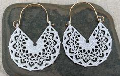 "These are so pretty and unique. White mandala hoop earrings are versatile and lightweight. They have incredible detail and design. Dress them or down. The perfect everyday earrings for any stylish gal! The hoops measure 1 7/8\" long by 1 3/8\" wide. I have these available in 5 other color ways as well. Here are direct links to each Pink : www.etsy.com/listing/1156752146 Light Purple : www.etsy.com/listing/1157758318 Orange - www.etsy.com/listing/1172383597 Green : www.etsy.com/listing/116109657 White Festival Earrings For Pierced Ears, White Bohemian Pierced Earrings, White Hoop Earrings For Festival, Nickel Free White Jewelry For Festivals, Nickel Free White Jewelry For Festival, Nickel-free White Jewelry For Festivals, Handmade White Hoop Earrings For Festivals, White Bohemian Pierced Hoop Earrings, Bohemian White Pierced Hoop Earrings