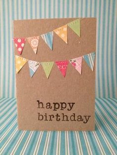 a happy birthday card with bunting flags on it