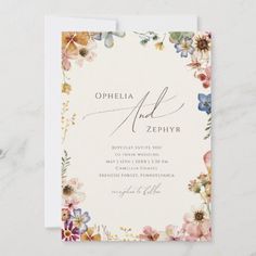 an elegant floral wedding card with the word ophelia and zephry on it