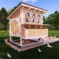 the chicken coop is made out of wood and has windows on each side that allow birds to look outside