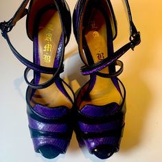 Size 9. Worn Maybe A Handful Of Times. Look Brand New. Originally $495. Luxury Purple Heels With 4-inch Heel, Purple Leather Party Heels, Purple High Heel Shoes With Leather Sole, Purple Heels With Leather Sole For Formal Occasions, Purple High Heels With Leather Sole, Purple Heels With Leather Sole For Formal Events, Formal Purple Heels With Leather Sole, Purple Leather Heels With 4-inch Heel, Designer Purple Leather Heels