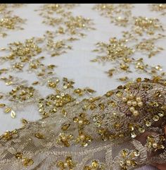 Gold beaded embroidery lace comes is handmade with a beautiful scallop border designed with rhinestones. it is soft and of high quality. Perfect for wedding dress and any other outfit for a special occasion. 100% polyester Listing is per yard and a continuous piece if its more than 1 yard. Ready for shipping   Contact us for your custom made dress using this fabric Beaded Lace Fabric, Nigerian Lace, Wedding Lace, Lace Bridal, Gold Lace, Other Outfits, Lace Weddings, Bridal Lace, Beaded Lace