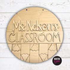 a wooden sign that says ms nelson's classroom