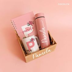 a pink gift box with personalized items in it on a pink background that says pamella