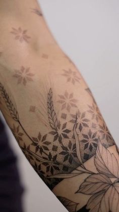 a person with a tattoo on their arm