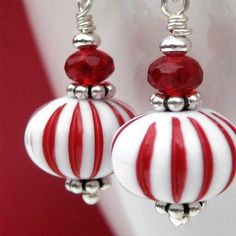 red and white striped glass bead earrings with swarong crystals on silver earwires