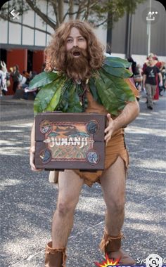 a man dressed in costume holding a sign