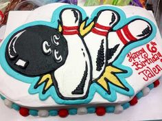 a birthday cake with a bowling ball on it