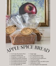 an advertisement for apple spice bread in front of a painting and framed image with text