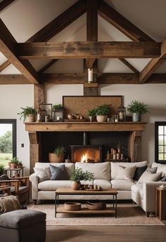 a living room filled with furniture and a fire place in the middle of the room