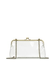 Make a style statement with the elegant Potenaz in our new Clear Bag Collection. When your destination requires a clear bag, the Potenaz is a great choice. Carry it with the chain strap or remove the strap and carry it as a clutch. This vintage-inspired profile is practical and appealing. 100% PVC Kiss-lock closure Signature brushed metal hardware, heavy handcrafted stitching Dimensions: 10 1/4"(W) x 5 1/2"(H) x 1 7/8"(D) Strap drop: 18 1/2" Satchel Backpack, Ocean Jewelry, Jewelry Candles, Clear Bag, Leather Denim, Rose Jewelry, Bag Collection, Clear Bags, Belt Accessories