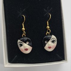 Vintage Fancy Faces Hand Painted Porcelain Mask Face With Rhinestones Drop Earrings On Brass French Hooks Half And Half Black And White Design With Rhinestone Eyes Unworn, In Original Packaging Handmade In New Orleans, Louisiana Porcelain Mask, Packaging Handmade, Face Jewellery, Rhinestone Eyes, Half And Half, Mask Face, New Orleans Louisiana, Eye Earrings, Painted Porcelain